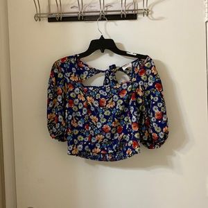 Women open back shirt